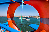Ferry boat to Armona island, View through lifebuoy, Olhao, Algarve, Portugal