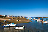 Boats in lagoon, Cabanas near Tavira, Algarve, Portugal