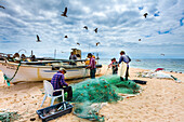 Fishermen on the beach, Armacao de Pera, Algarve, Portugal