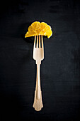 Fork with orange slice