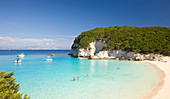 View across the clear turquoise waters of Vrika Bay, Antipaxos, Paxi, Corfu, Ionian Islands, Greek Islands, Greece, Europe