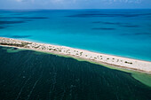 Aerial view of the color contrasts of Barbuda, tones change according to the current and the difference of seafloor, Barbuda, Antigua and Barbuda, Leeward Islands, West Indies, Caribbean, Central America