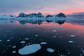 Sunrise over Wiencke Island in the Neumayer Channel, Antarctica, Polar Regions