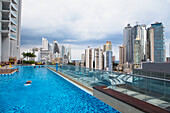 A poolside view overlooking the newer side of the Panama City skyline, Panama City, Panama