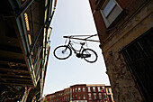 Hanging bicycle in Williamsburg, Brooklyn, New York City, New York, United States of America
