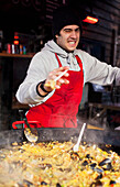 Paella salesman, Camden Market, London, England