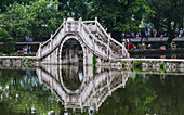 Stone bridge over Nanhu Lake, Hongcun, Anhui, China
