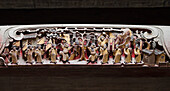 Wooden beam decorated with carvings of scenes from Qing dynasty life in Chengzhi Hall, Hongcun, Anhui, China