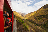 People on the viewing platform of the Observation car of the Tren Crucero train, Nariz del Diablo (Devil's Nose), Chimborazo, Ecuador