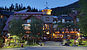 'Twilight descends upon Dusty's Bar & BBQ at the base of Whistler Mountain; Whistler, British Columbia, Canada'