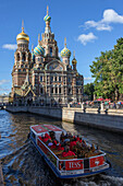 boat on the griboedov canal, church of the savior on spilled blood, neo-russian style, saint petersburg, russia