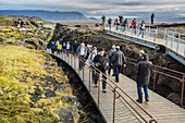 gorges of the almannagja, thingvellir national park, site of the old parliament where the independence of iceland was proclaimed, listed as a world heritage site by unesco, a fault zone and active volcano zone, the golden circle, southeastern iceland, eur