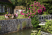 family in the garden of the bed breakfast of the auberge grand'maison, meauce, eure-et-loir (28), france