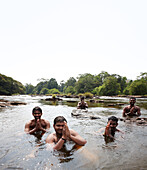 Tourists from Chennai bathing in the Chalakudy River, above the Athirapally Waterfalls, Athirapally, eastern Chalakudy, Western Ghats, Kerala, India