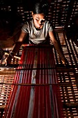 'Camdodia, Ratanakiri Province, Phomkres village, Sendan Kandan weaves a traditional blanket called ''puy'''