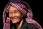 'Camdodia, Kratie Province, Chhlong town, the market, Thi Leang weras the traditional head scarf called ''krama'''