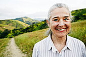 Caucasian woman standing on hiking trail