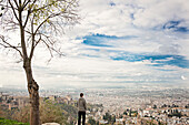 Man admiring scenic view of cityscape, Granada, Spain