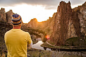 Caucasian man admiring scenic desert landscape, Smith Rock State Park, Oregon, United States