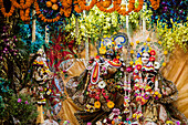 Krishna and Radha statues decorated in Hindu temple