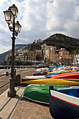 Minori, colourful boats on the  promenade with beach in early spring, Costiera Amalfitana (Amalfi Coast), UNESCO World Heritage Site, Campania, Italy, Europe