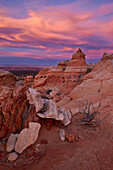 Orange clouds at sunset over sandstone cones, Coyote Buttes Wilderness, Vermilion Cliffs National Monument, Arizona, United States of America, North America