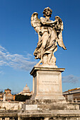 Bernini's breezy maniac angels statue on the Ponte Sant'Angelo with St. Peter's Basilica behind, Rome, Lazio, Italy, Europe
