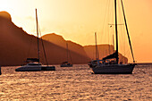 sailing ships at sunset anchoring at Bequia island, sea, St. Vincent, Saint Vincent and the Grenadines, Lesser Antilles, West Indies, Windward Islands, Antilles, Caribbean, Central America