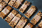 Two Rows of Homemade Granola Bar Tied with Twine