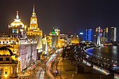 Evening on the Bund, bank buildings, illuminated, Huangpu River, traffic, Shanghai, China, Asia