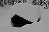 Snowy hut in the Lesach Valley, East Tyrol, Austria