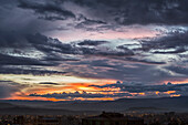 The sunset colours the skies above the city of Cochabamba, Cochabamba, Bolivia