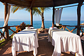 Couples massage tables set up on the beach, Puerto Vallarta, Jalisco, Mexico