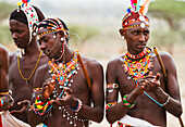 'Samburu men singing and dancing, Samburu County; Kenya'