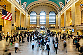 Blurred view of people in train station, New York, New York, United States