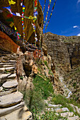 Ranchung Cave, Buddhist monastery, cave temple, gompa with prayer flags, near Samar, Kingdom of Mustang, Nepal, Himalaya, Asia