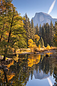 Half Dome and the Merced River surrounded by fall foliage, Yosemite National Park, UNESCO World Heritage Site, California, United States of America, North America
