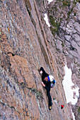 A man rock climbing on the Diamond, Rocky Mountain National Park, Estes Park, Colorado.