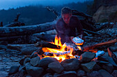 Cooking over a campfire on the beach