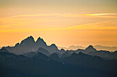 ayers of mountain silhouettes including the west face of Mount Judge Howay, British Columbia, Canada.