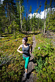 Trail running in Bowron Lake Provincial Park.