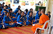 Pupils in a temple in lesson with a monk, Chiang Mai, North-Thailand, Thailand, Asia