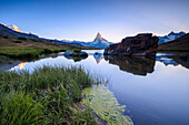 The Matterhorn reflected in Lake Stellisee at dawn, Zermatt, Canton of Valais, Pennine Alps, Swiss Alps, Switzerland, Europe