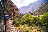 Train between Aguas Calientes Machu Picchu stop and Ollantaytambo, Cusco Region, Peru, South America
