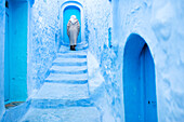 Local man in the blue streets of the Medina, Chefchaouen, Morocco, North Africa, Africa