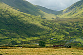 Steam engine and passenger carriage on trip down Snowdon Mountain Railway, Snowdonia National Park, Gwynedd, Wales, United Kingdom, Europe
