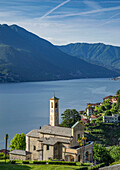 Aerial view of waterfront church and Lake Como, Argegno, Italy