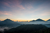 Hilltops over morning fog in remote landscape, Kintamani, Bali, Indonesia