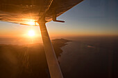 Airplane flying over Catalina Island, California, United States