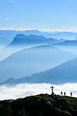 Several persons standing at summit of Heuberg, fog in valley of Inn, Pendling in background, view from Wasserwand, Wasserwand, Heuberg, Chiemgau, Chiemgau Alps, Upper Bavaria, Bavaria, Germany